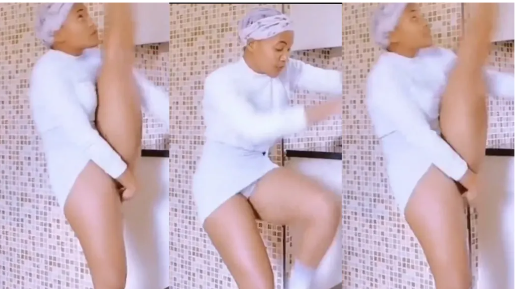 Pretty slim fit lady shows off her white panties as she does the Zulu dance
